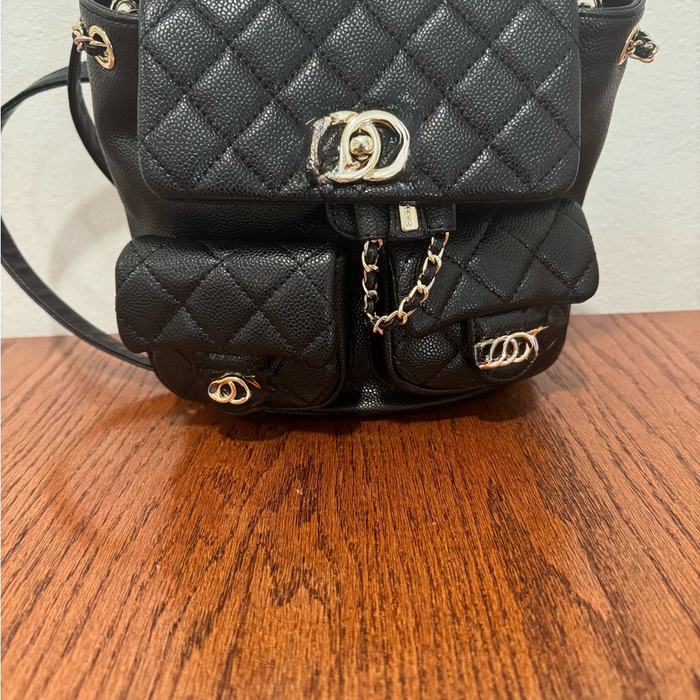 Quilted Black Leatherette Mini Backpack with Gold Hardware